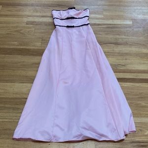 Blondie Nites size 3 prom pink dress with black bow detail and open back.